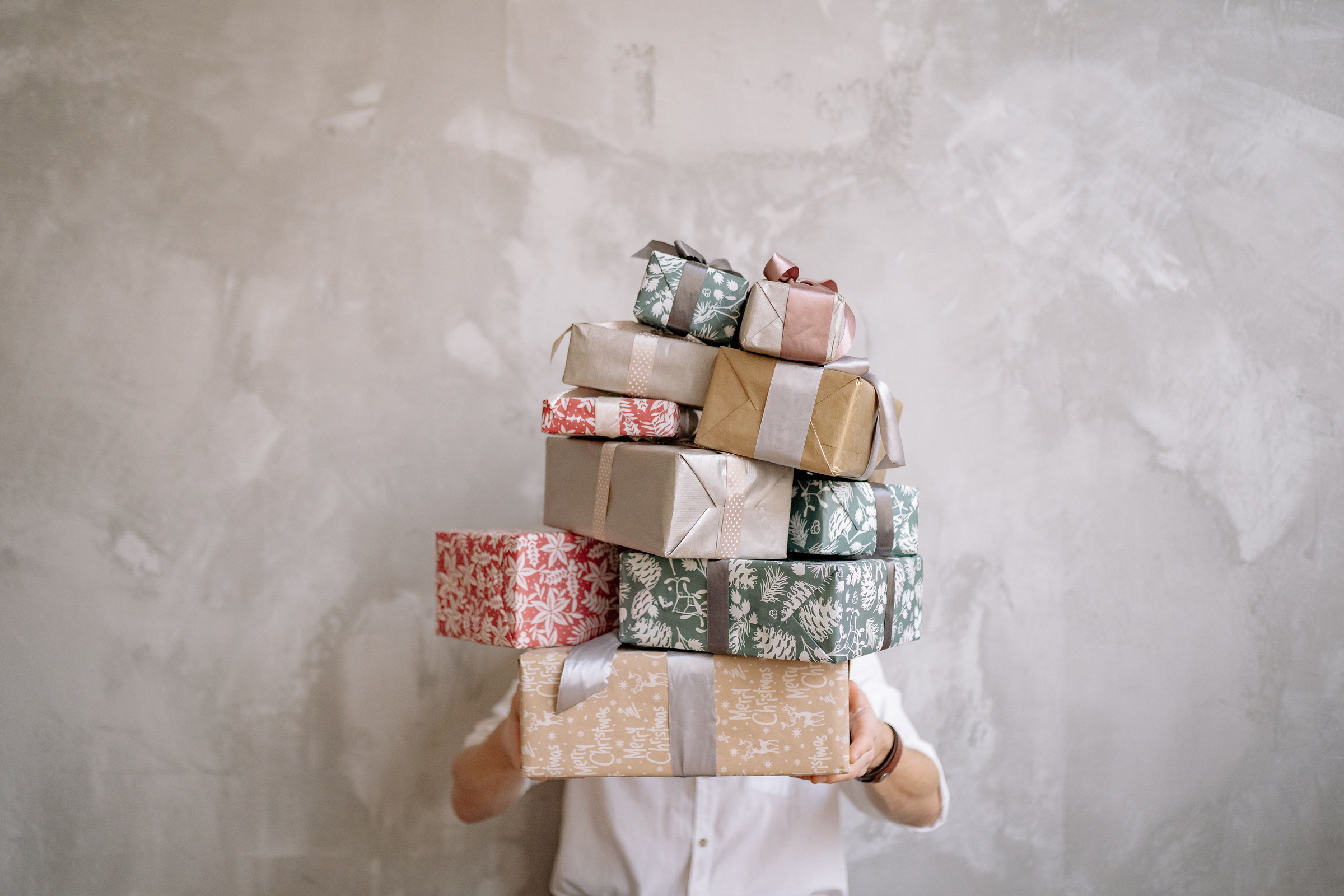 Boxes of Gifts Carried by a Man